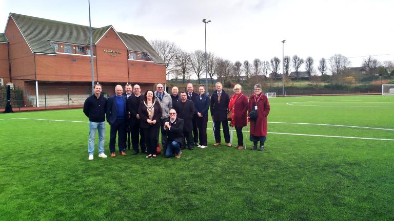The mayor and contractors involved in creating the new pitch at the site
