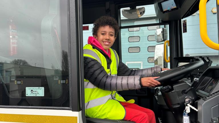 Bin lorry fan Jerome in the cab of the lorry