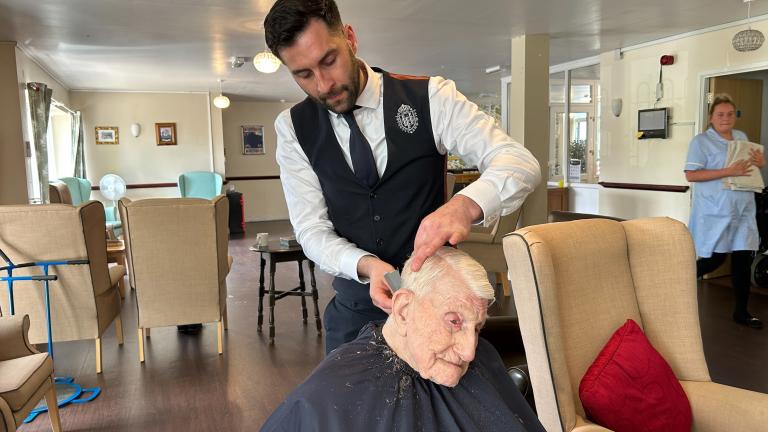 Donald getting trim with the master barber