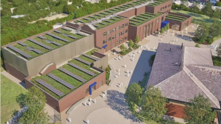 New school’s rooftop grass and solar panels 