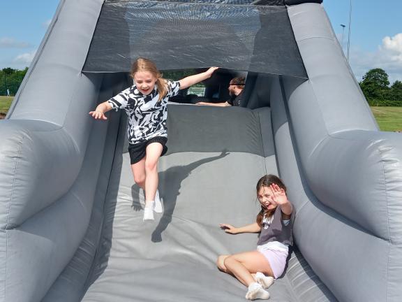 children on a bouncy castle
