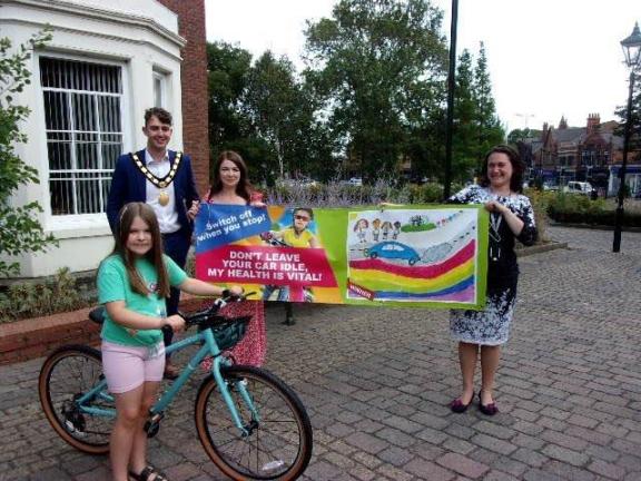 Bike winner Ivy with Mayor Cllr Harry Atkinson, mum Annabel Marriott and Dr Victoria Richards,
