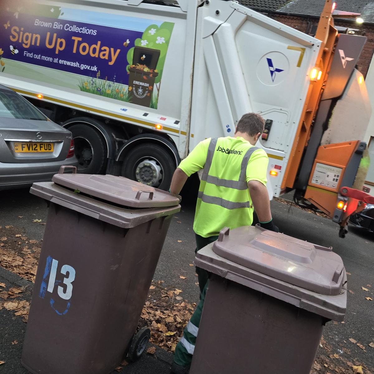 Crews drag bins to the refuse lorry