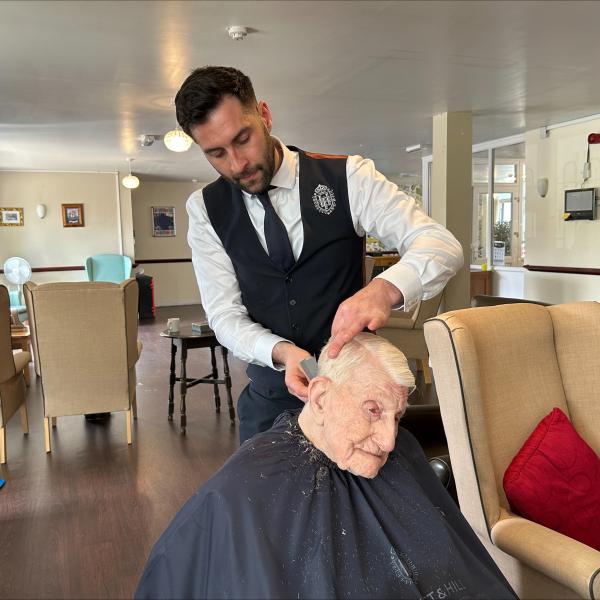 Donald getting trim with the master barber 