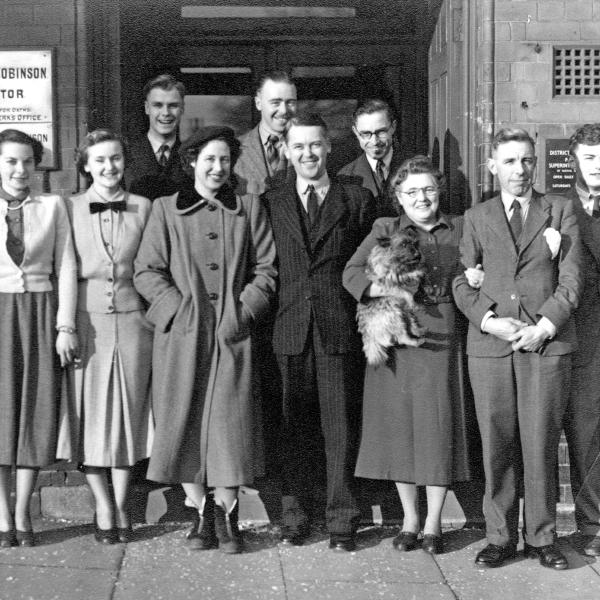 Paul Robinson, centre with wife Hope, in a staff photo at the Ilkeston solicitors he 